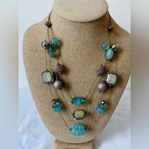 MULTI-STRAND BEADED NECKLACE